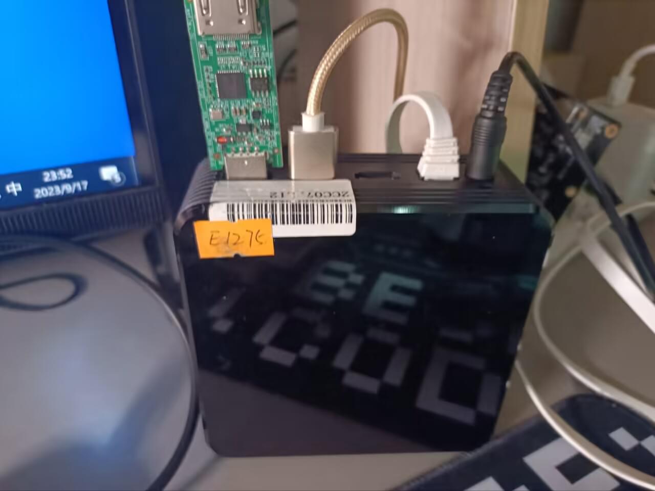 Hardware setup—note that the capture card casing was removed because the enclosure blocked a USB port