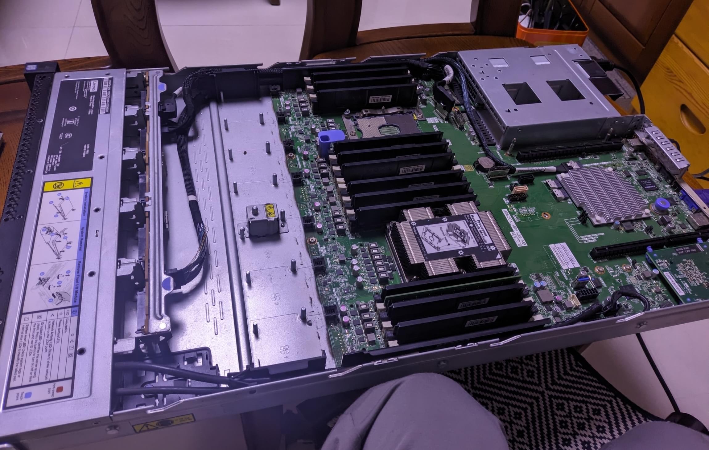 Delivery guy helped carry it upstairs. Some scratches on the case, dusty fans, average condition but fully functional